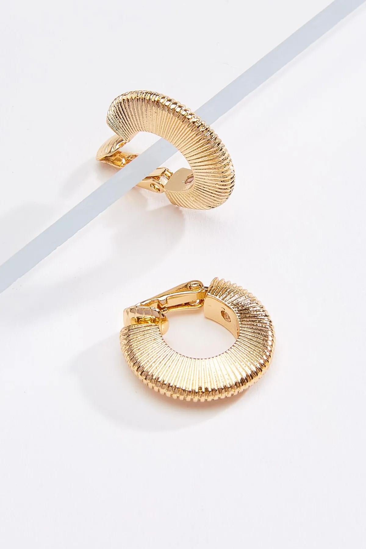 textured_clipon_hoop_earrings_0.webp Shop Textured Clipon Hoop Earrings Women Earrings